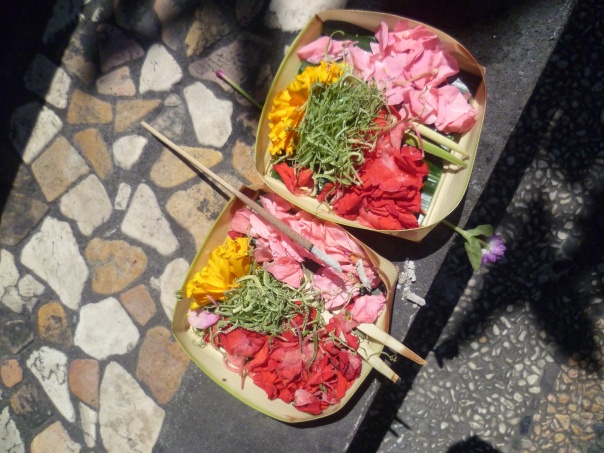 Offerings like this are made daily and we saw them on sidewalks, in front of doors, by restaurants, everywhere,